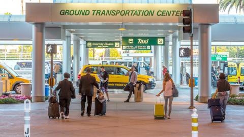 People waiting at the Ground Transportation Center