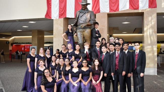 Orange County Highschool Musical Group in front of John Wayne Statue