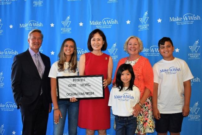 Pictured (left to right): Airport Director Barry Rondinella, wish kid Sage Escalante, Vice Chair Michelle Steel, wish kid Addison Chang, Make‑A‑Wish® Orange County and the Inland Empire, President and CEO Stephanie McCormick, and wish kid Zachary Mauldin.
