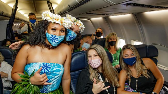 United flight to Honolulu passengers on plane