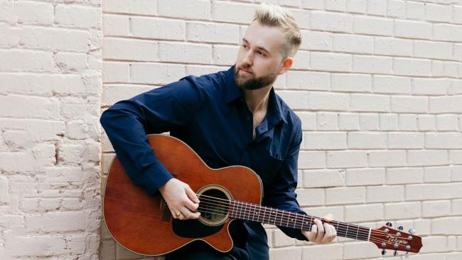 Blake Harper with guitar
