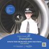 Young man wearing pilot cap standing in front of jet engine